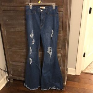 Ripped bell Bottom jeans size 15 stretchy